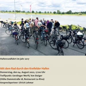 13.07.2022: Radfahrer am Krefelder Hafen, darunter Infotext zum Termin am 4.8.2022